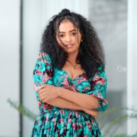 Modern Habesha ሽፎን ቀሚስ ዲዛይን – Elegant Tiered Flowy Dress for Weddings & Melsi